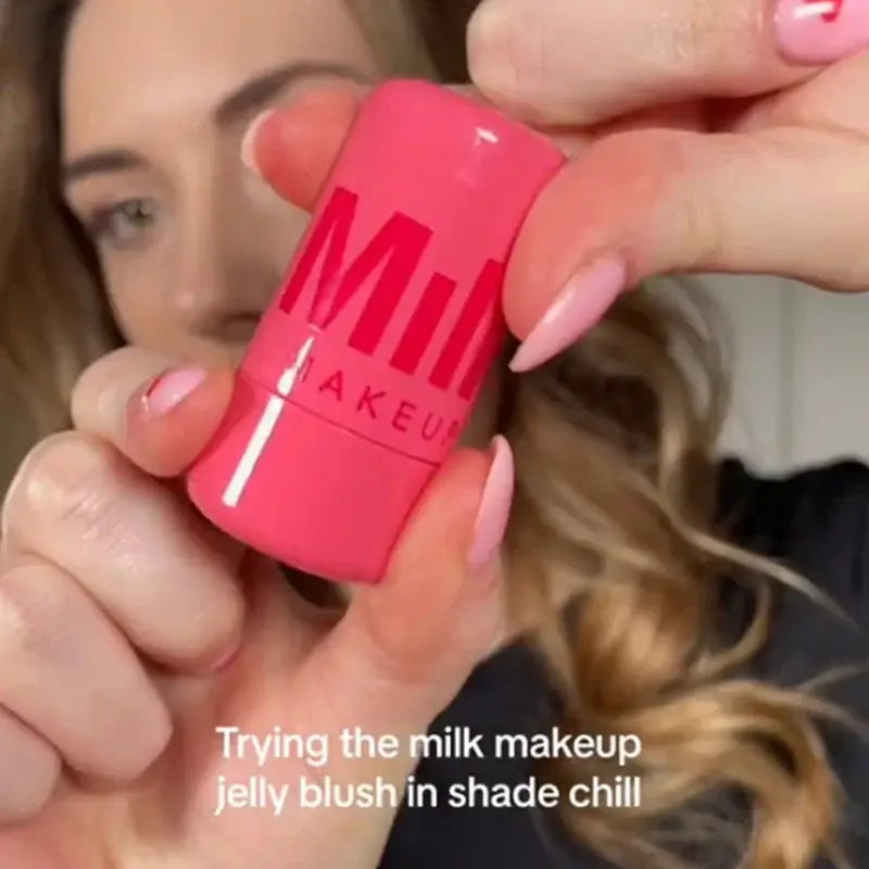 Applying Milk Makeup Cool Water Jelly Blush in shade Chill for a radiant, buildable color on lips and cheeks.